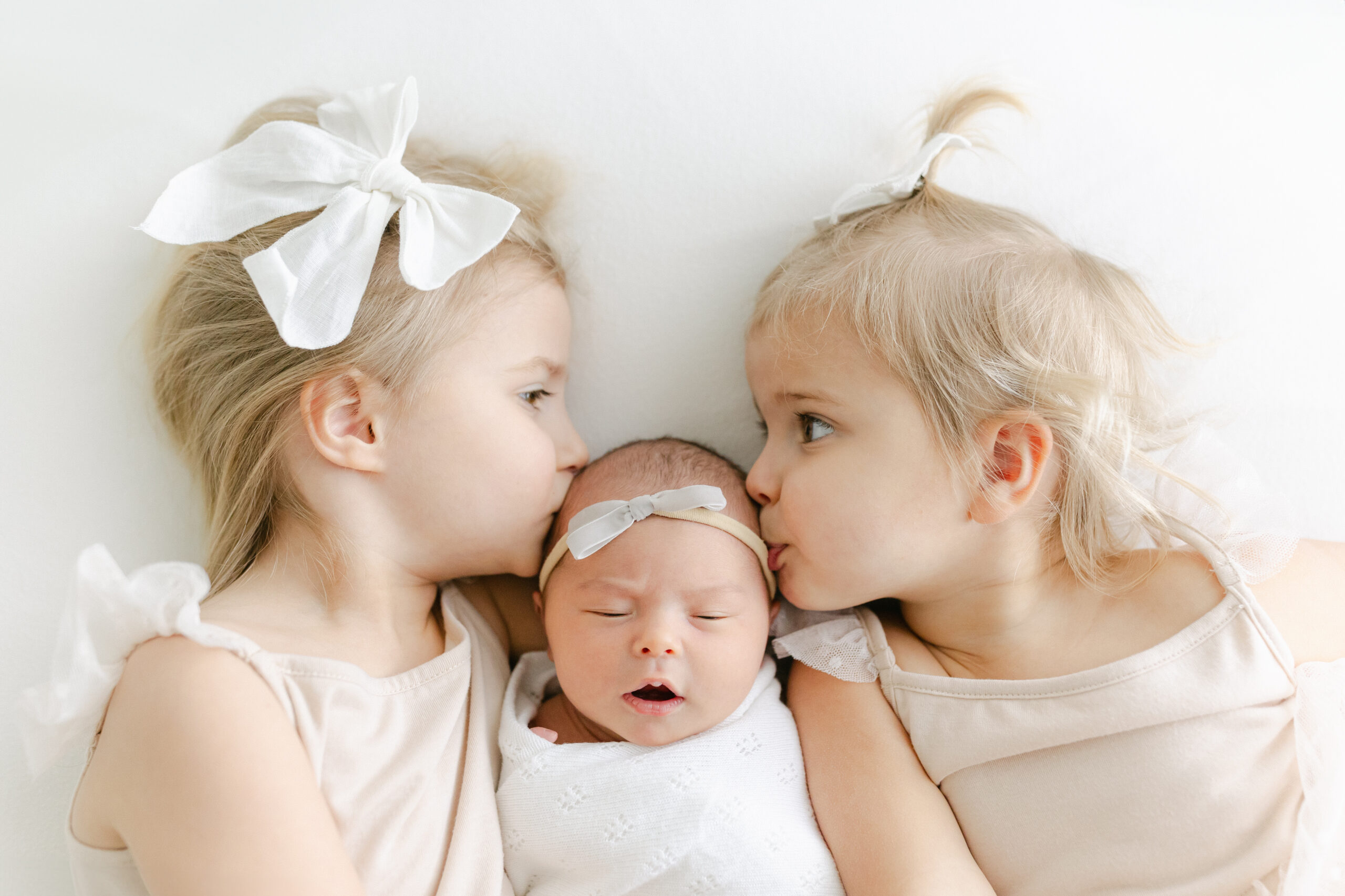 Newborn Photo with 3 kids